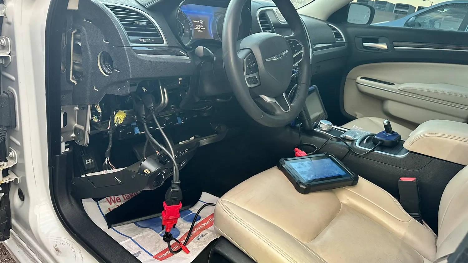 Diagnostic equipment connected inside a Chrysler vehicle