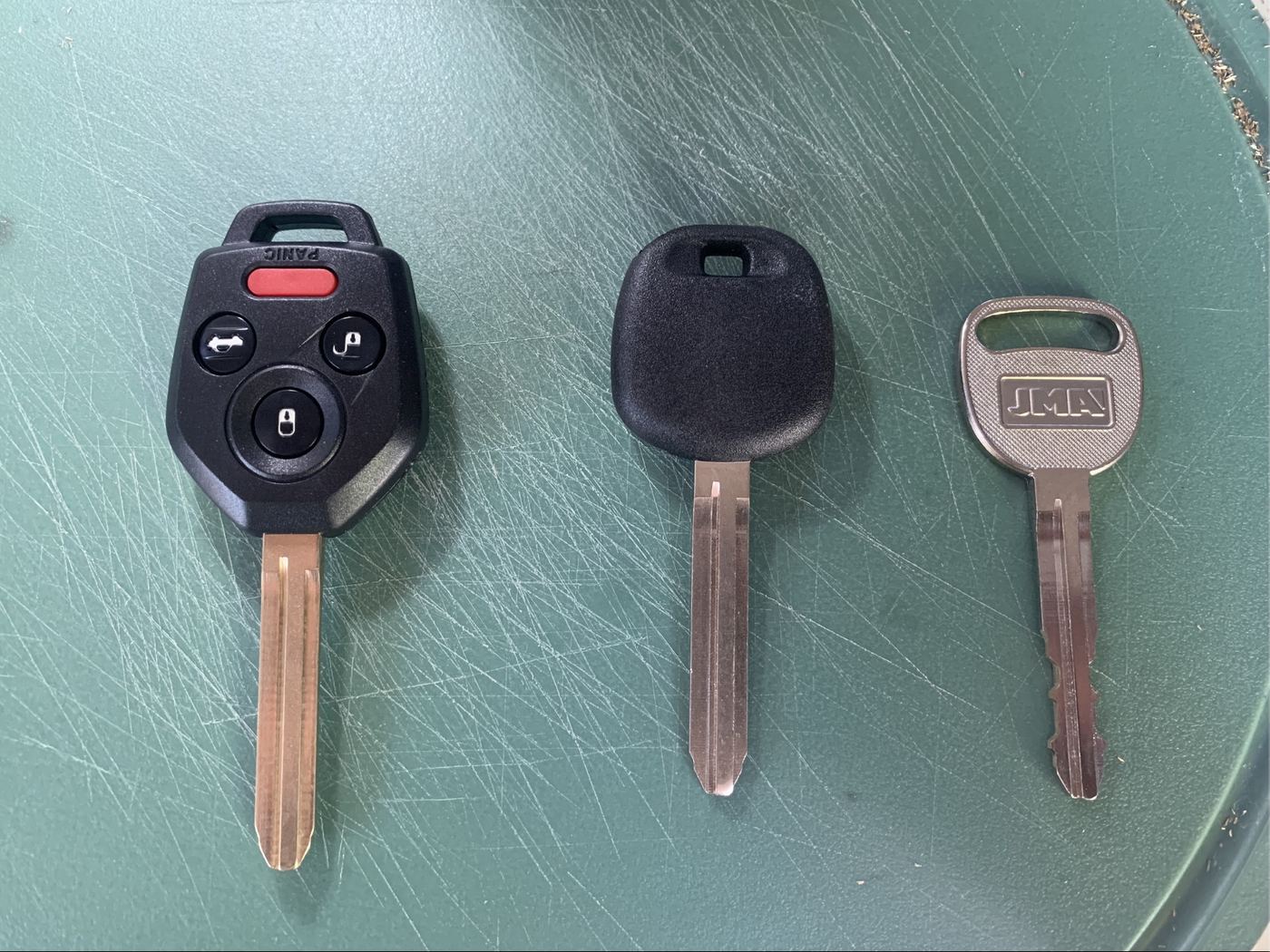 Subaru remote head key, transponder key, and metal key blank