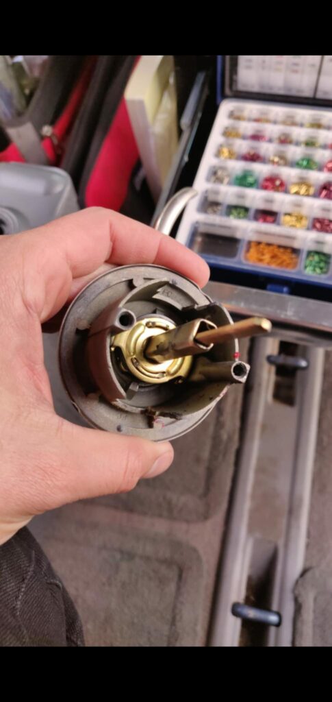 Locksmith working on a real lock cylinder