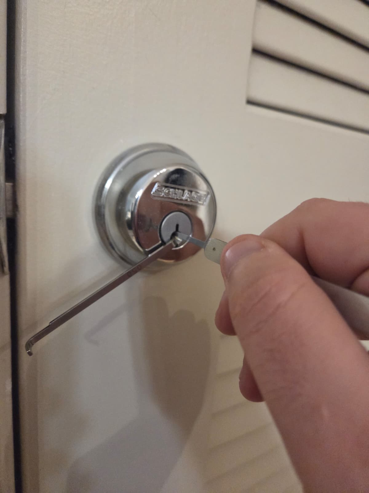 Key in a residential door deadbolt