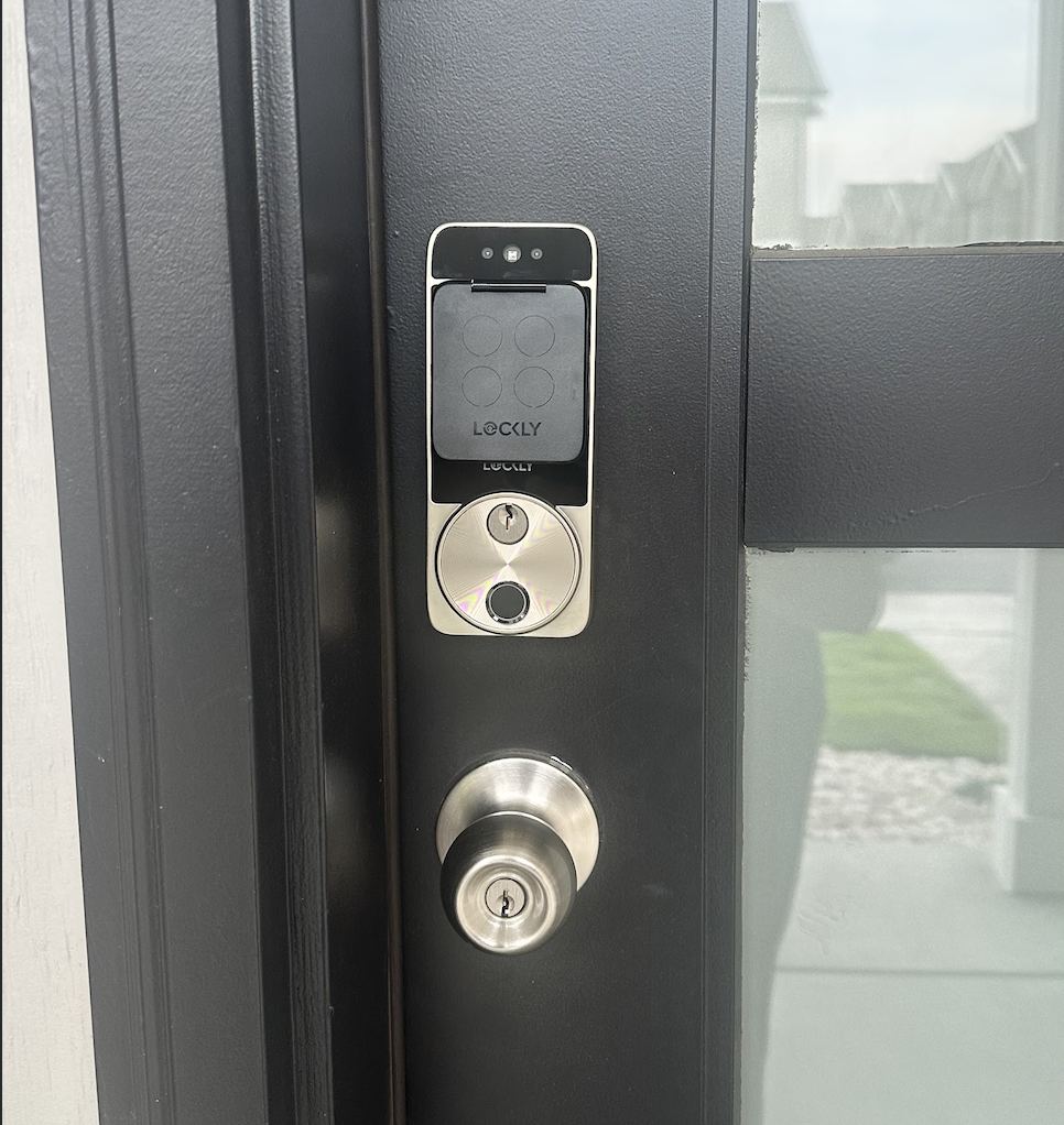 Lockly keypad lock with keyed knob on a residential entry door